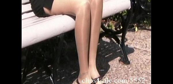  Sexy latina secretary shows off her pantyhosed legs in a park